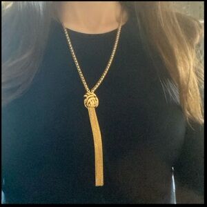 Etienne Aigner gold tone knot necklace